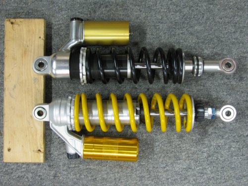 Detail 1
OEM Sachs on top (black spring) and Ohlins racing on the bottom (yellow spring).
