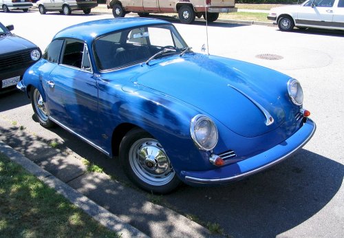 A beautifull Porsche 356 parked in the street.  Just one of several very nice cars that weren't in the show.
