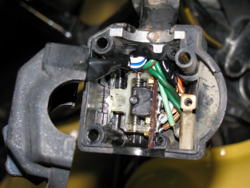 Turn signal switch
All apart.  Use white lithium on the left part of the switch, where the ball bearing rubs against the left wall.  Use dielectric grease everywhere else.
