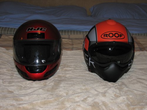Comparing helmets
On the left is my HJC.  It has served me well but way past it's service date.  On the right is my new ROOF helmet.  It's a round helmet compared to the HJC and has more distinct, unique styling.  It's modular, meaning the chin bar can unlock and rotate up and out of the way.  The ROOF also weighs 2-ounces less than my HJC, coming in at 1630-grams (Medium size).
