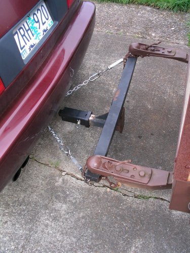 Close-up of the single-to-double hitch the previous owner made.  I had to use a 1.25" to 2" adapter to pull it behind my Jetta.  Was a little squirly even though I went no faster than 60mph.  Definitely will be stable once I make a real hitch for my Squareback.
