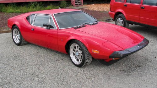 DeTomaso Pantera.  Italian bodied with Ford 8-cylinder engine.

