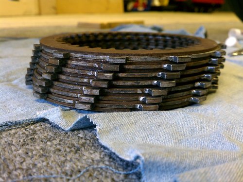 The clutch stack.  See how the left edge of the friction plate teeth are worn and hammered.
