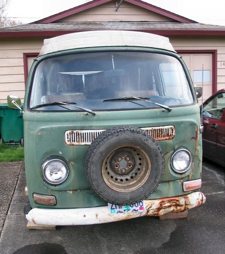 Not pretty but the door still opens.  A pull on the nose should help it out.  Then cover with a bra ;-)
