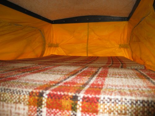 Upper sleeping area inside pop-top has room for two adults as well!
