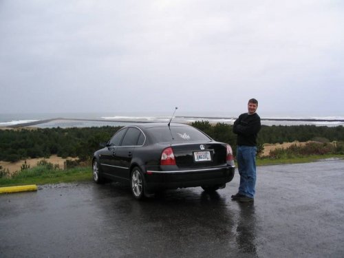 Antonette taking a picture of me and her car at the lighthouse parking lot.
