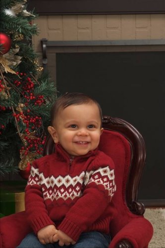 Professional pictures (well, we paid for them) of da family.  This is Ronin.  He's cute and likes to flirt with women.  Not girls...women!
