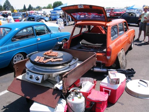 Adam's blue fasty and my baby toting a single-wheel trailer with Adam's EVO grill on-board.
