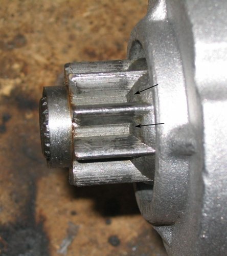 Arrows show wear on new HPA starter.  Was making an odd, metalic buzzing sound during start testing after install.  Removed and saw that the starter was engaging too far and thus rubbing against the flywheel.
