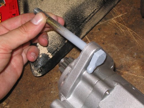 Since there is no notch to hold the retaining bolt I welded on a tab.  It keeps the bolt from rotating when removing/applying the retaining nut.
