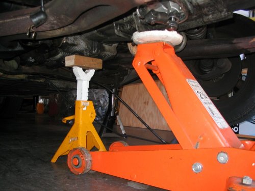 Engine is supported and the jack placed for removing the tranny.
