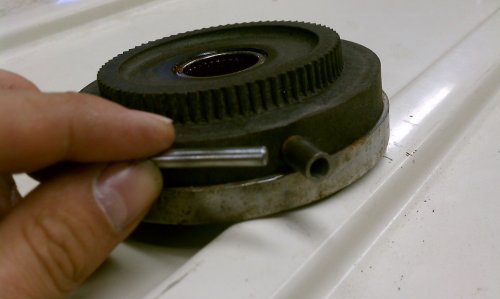 I ground the planetary pin level and then drilled a 3/16" hole in it to a half-inch depth.  I got a piece of 3/16" rod from the local hardware store, beveled the edge, then pushed it into the hole.
