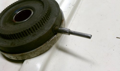 Pin welded in and ground.  The gears are plastic and so after each weld you need to dip the pin into water to cool it down otherwise the plastic holding the pin will melt...as I found out.  But the plastic didn't melt too badly and the original pin is still secure.
