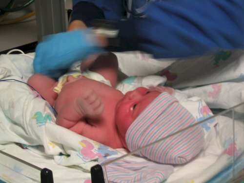 Getting his first diaper.
