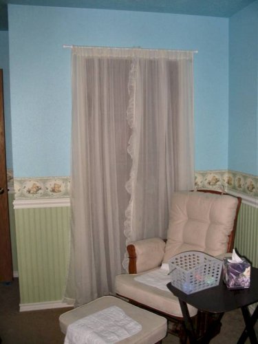 Removed the door and used sheer curtains instead.

