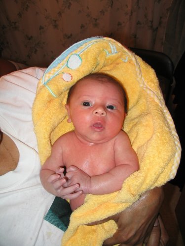 Grandma Mimi drying off the Li'l Monkey.
