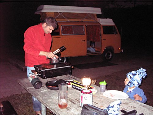 Daddy fixin' steaks for dinner.
