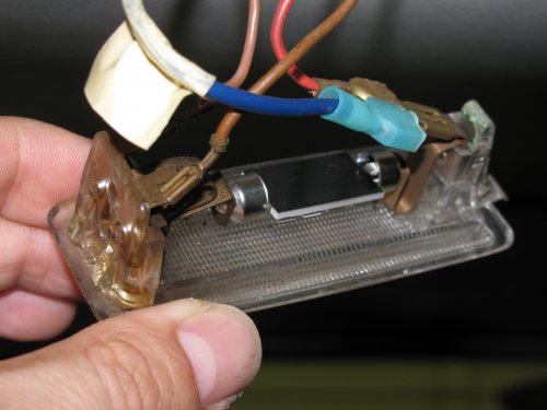 LED unit installed.  LEDs are facing down, towards the clear lens.  The back (shown) does get hot enough to burn so don't rest anything on it.
