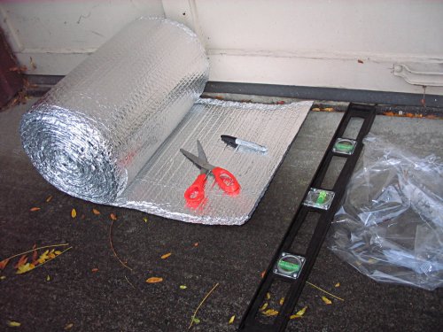 Measure the length needed to be wrapped, add 1/2" to 1" extra, and cut with ordinary scissors.  The wrap I used was 16" and it worked well to wrap the circumference of the duct with a little over-lap.  Put the over-lap seam down so if water should get in, it will drain out.  I had 11" and 8" zip-ties so I used them together to hold the wrap.  Snug it down until it just dimples the insulation; don't reef down on it and over-tighten it!
