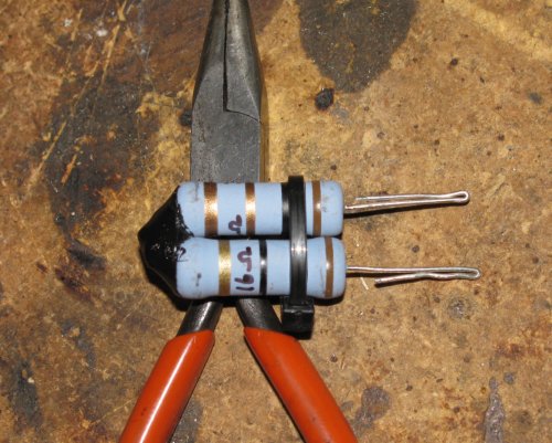 I used a small zip-tie to keep the resistors together while working on them.  Not critical to have but makes the pack more sturdy and easier to handle.  You can also see that I bent the wires back on themselves, essentially making them thicker.  This allowed me to crimp spade connectors to them...
