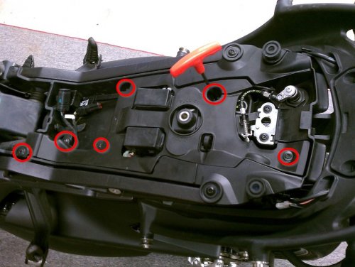 "Tool tray" needs to be removed for tucking the wires in on the right side.  There are six of the 4mm fasteners holding it down.
