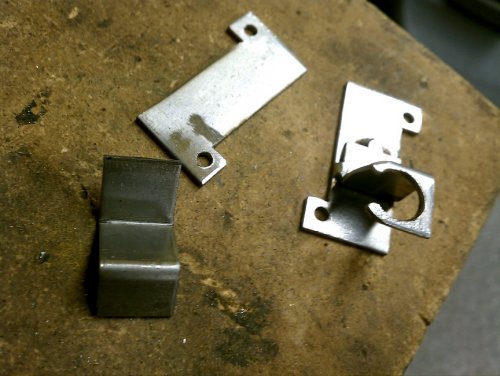 Left side are the 'raw' bits that make up the mounts.  On the right is the completed right mount.
