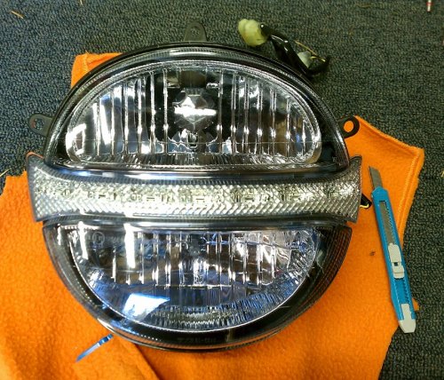 Both top and bottom covered, LED uncovered.  I know the bottom looks blueish but the film is the same color on top and bottom.
