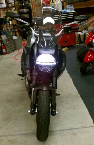 With film applied.
Low beam (regular OEM bulb) and running light.
