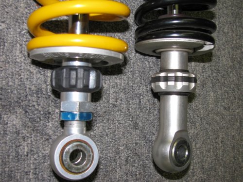 Detail 3
The Ohlins shock (left) has an adjustable lower mount as seen by the blue locking nut and threads.
