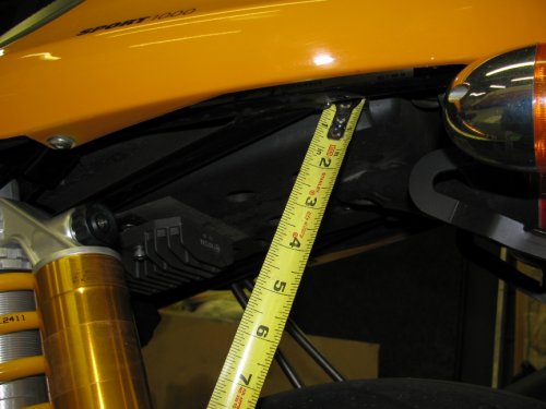 There's a indentation in the seat pan that my tape measure consistently fit nicely in.
