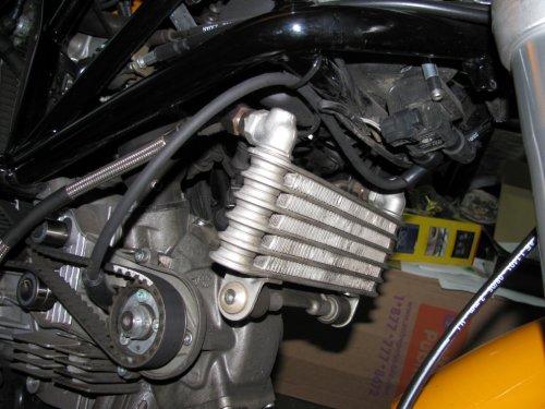 I installed the new wire on the same path as the stock wire, just moved the zip-tie a little closer to the right so the wire wouldn't rub on the oil line fitting.  I tried to position the wires from rubbing against any parts.
