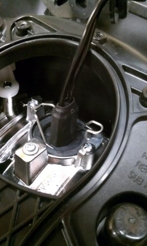 How the HID bulb looks when installed.  It can only go in one way so it's pretty easy.  Don't do it now as we need to get the electronics installed first!
