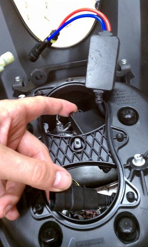 This shows the plug and orientation of the ballast.  That plug is where the power comes in once everything has been installed.  Notice the ignitor is outside of the headlight housing.
