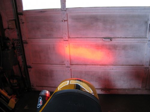 Stock bulb, brake light mode.  Notice how the lens focuses the light.
