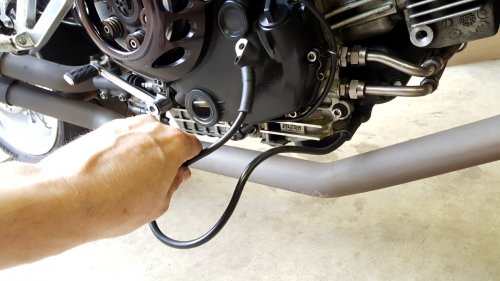 Remove the OEM cables.  This is the cable from the starter relay to the starter.  Mine was in really good condition for having over 16,000 miles on it.  Even the starter post under the cable boot was clean!
