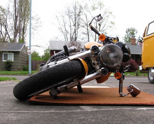 It's okay, I put her down to show how the sliders work.  Unfortunately, the handle bar ends are gonna get bruised so maybe handle bar sliders would be a good idea for those who don't keep the stock mirrors.
