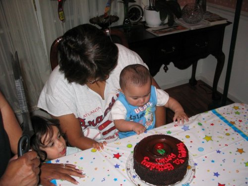 Mimi giving Ronin his 1/2 birthday
