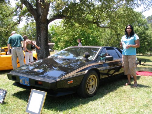 Antonette next to a Lotus.  Nice looking cars.
