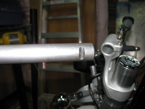 Hi-riser is slipped on the fork tube and here is the bar in stock form.
