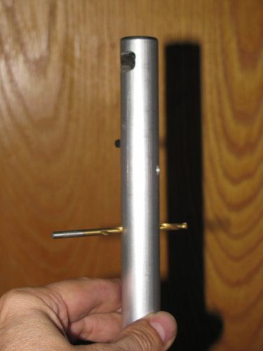 The end result of the drilling.  Yes, the hole is perpendicular.
