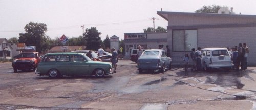 Day 2: Saturday
The next day the "prom-queens" wash their rides at a children's car wash. The kids made out pretty good; we paid them $3 and we washed our own cars while they watched and asked a bunch of questions. Funny looking cars with their engine in the back can create quite a few.
