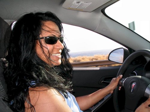 Antonette enjoying the rental car, a 2007 Pontiac G6 GT.
