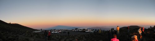The parking lot directly behind us with the shadow of the crater being cast by the sun across the misty morning.
