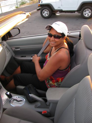 It took some serious convincing to get my sweetie to go drive an hour to a restaurant.  Doesn't she look good in a ball cap?
