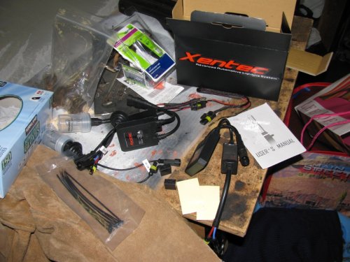 Xentec - The kit I used.  Also, remove the DRL (Daytime Running Lights) relay, #173.  It's located where the fuses are but a little deeper behind the dashboard -- it easily pulls straight out.  Yes, you'll have to manually turn on your lights when you drive now.  You can drive with the relay intact and the lights will come one (well, ours did), but the HIDs are getting a reduced voltage and may not turn on, they could even turn off while driving due to the reduced voltage feeding them.  By removing the relay you insure that they get full voltage when you turn on the headlights.
