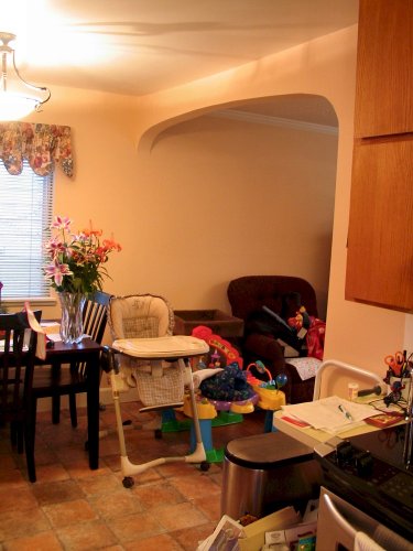 Looking from the kitchen into the new dining area and archway into the living room.
