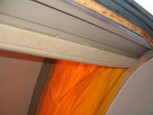 Looking up at interior trim from outside the sliding door.
