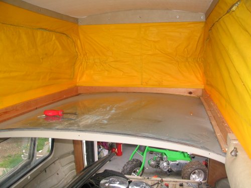 Bed bottom removed, exposing roof.
