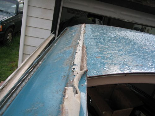 Yes, it rained a little while removing the top.  This is Oregon, ya know!
