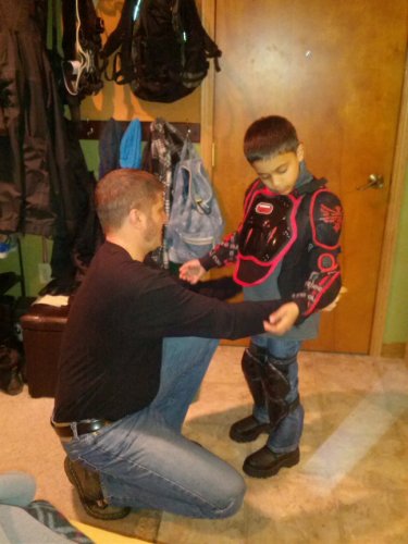 Test fitting the jacket.  Very adjustable with Velcro straps.
